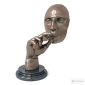 statuette of a smoking head